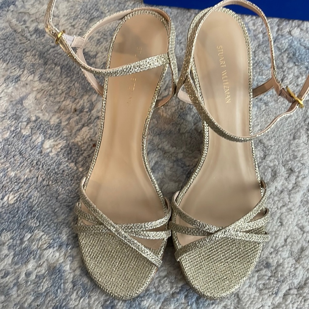 Stuart Weitzman gold heels. Never worn